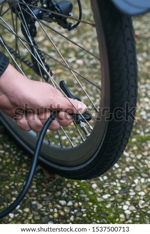 Similar – Image, Stock Photo Inflate bike tires