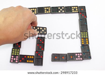 Domino effect. The Falling Domino Prinsiple. The Domino principle. The game of dominoes.