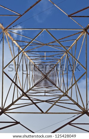 Abstract unusual view from beneath an old radio tower.