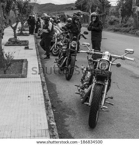 SICILY, ITALY - APRIL 5, 2014: Members of H.O.G. Malta Chapter ride their Harley-Davidson motorcycles in Sicily. Harley Owners Group is made up of various local chapters from around the world.