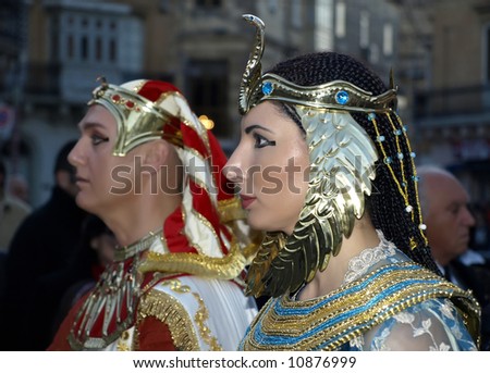 Woman dressed up as Queen Cleopatra during reenactment of Biblical times