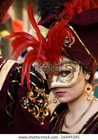 VALLETTA, MALTA - Feb 21st 2009 - Woman wearing beautiful Venetian style mask and costume at the International Carnival of Malta 2009
