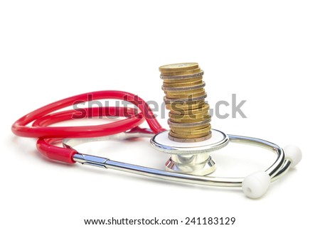 Medical expenses 4.  --  A stethoscope with a pile of coins on top.