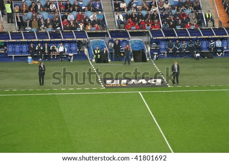 MADRID - NOV 21: Team coaches Pellegrini from Real Madrid on the right, Miguel Angel from Santander on the left, during football match Real Madrid - Santander, November 21, 2009 Madrid, Spain