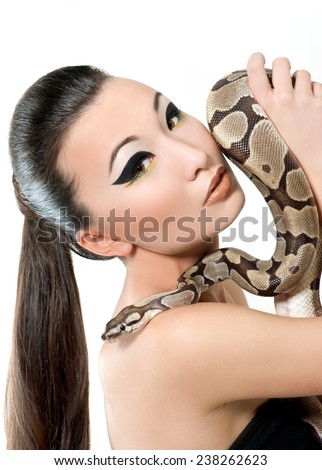 Beautiful woman with snake on white background.