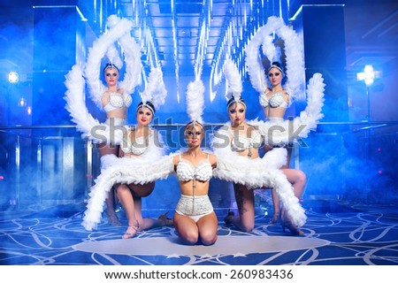 dance group sexy girls in suits, disco,