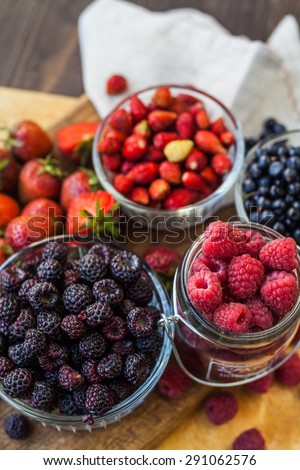 berry mix on wooden desk