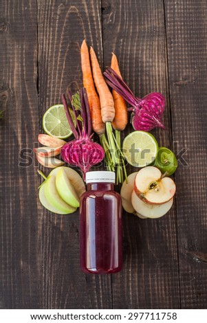Detox juice with beet, apple, carrot and lime