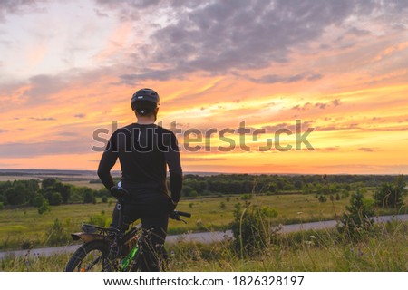 Similar – Image, Stock Photo Anonymous traveler admiring landscape of volcano under cloudy sky