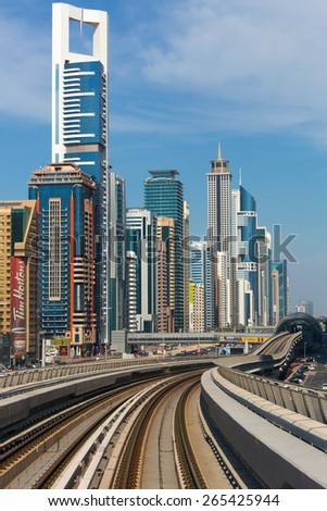 DUBAI CITY,UNITED ARAB EMIRATES-DECEMBER 5, 2013: Metro rails in modern part of Dubai city,United Arab Emirates