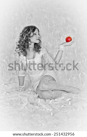 Girl holding a red apple  (Black and white)