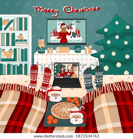 It is Christmas pizza time with cocoa with marshmallows at home. Two people have a video call with friends. There are TV set, bookcase, tree, bed with plaid, toys, gifts in the room
