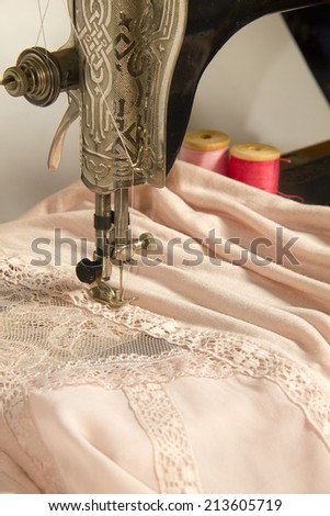 Vintage Sewing machine and item of clothing material