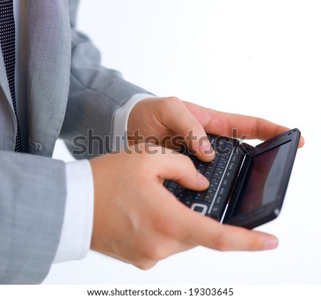 Close up of middle aged business man using cell phone