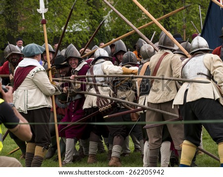 Actors wearing Stuart era,17thcentury,(reign of king Charles 1st) costumes. they are reenacting the siege of Bolsover Castle, in Derbyshire, UK, an event during the English Civil War.taken  05/05/2014