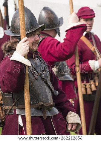 Actors wearing Stuart era,the 17th century,(reign king Charles 1st)costumes.they are reenacting the siege of Bolsover Castle,in Derbyshire,UK, an event during the English Civil War.taken  05/05/2014