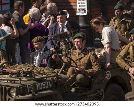 World war two enthusiasts reenact the era in period costumes and uniforms, at The National Tramway Museum,Crich,derbyshire,UK.taken 06/04/2015