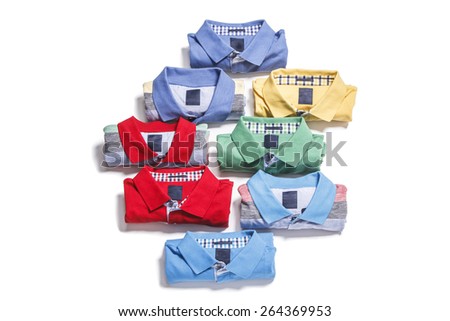 Overhead shot of assorted colored men\'s polo