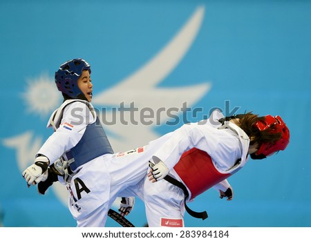 INCHEON,SEP 20: Chanatip Sonkham of Thailand(b)competes with Li Zhaoyi of China during the women -49 gold medal the 2014 Asian Games at Ganghwa Dolmens Gym on September 30, 2014 in Incheon,South Korea