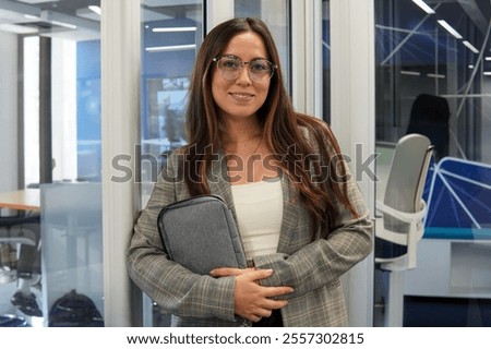 Similar – Image, Stock Photo Executive woman in her office with large windows where the light enters.
