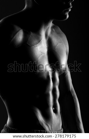 muscular body, abdominal muscle , pectoral muscle, black and white photo