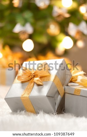 Boxes of presents under the Christmas tree