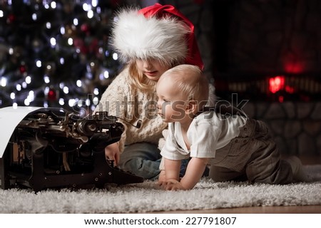 Children write a letter to Santa Claus wishes