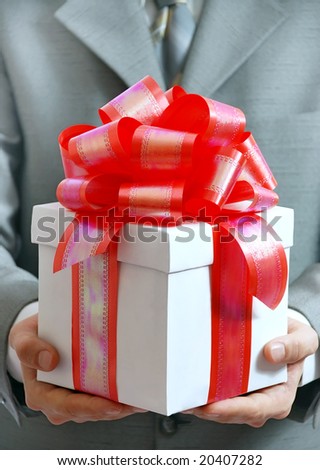 Gift in hands of the businessman