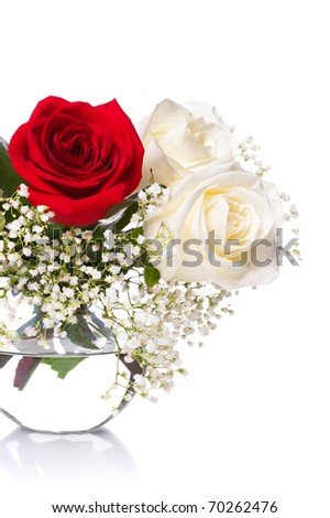 White roses in a vase with water on a white background