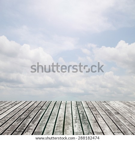 old wooden floor platform on sky clouds, nature background