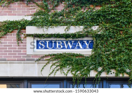 Subway entrance sign in the Bushwick neighborhood of Brooklyn, New York. Stock fotó © 