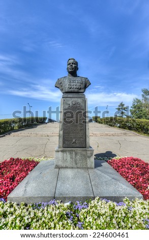 IRKUTSK, RUSSIA - SEPTEMBER 4, 2013: Monument to Afanasii Pavlantevich Beloborodov - Army General, twice Hero of the Soviet Union. Standing on the banks of the Angara River, Irkutsk, Siberia, Russia.