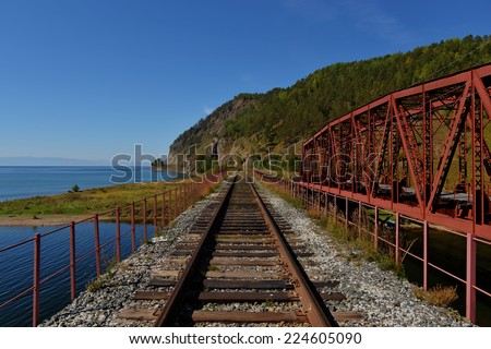 LAKE BAIKAL, RUSSIA - SEPTEMBER 5, 2013: The Circum-Baikal Railway Bridge - a historical railway that runs along Lake Baikal in the Irkutsk region of Russia.