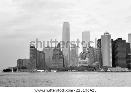 NEW YORK, NEW YORK - SEPTEMBER 21, 2014: View of Downtown Manhattan, New York from the East River on a fall cloudy day.