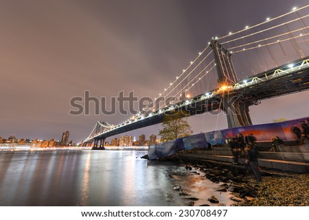 BROOKLYN, NEW YORK - NOVEMBER 8, 2014: Brooklyn Bridge at night viewed from the Brooklyn Bridge Park in New York City.