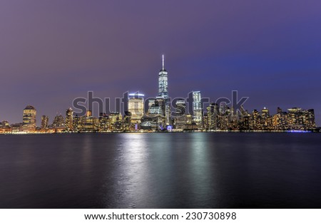 New York City Manhattan skyline at dusk over Hudson River viewed from New Jersey