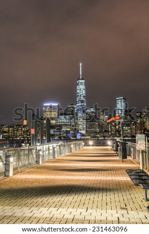 JERSEY CITY, NEW JERSEY - NOVEMBER 8, 2014: New York City Manhattan skyline over Hudson River viewed from New Jersey piers
