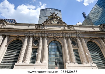 NEW YORK, NY - AUGUST 17, 2013: Grand Central Terminal with MetLife Building of New York in the background. Grand Central Terminal is a commuter rail terminal station at 42nd Street and Park Avenue.