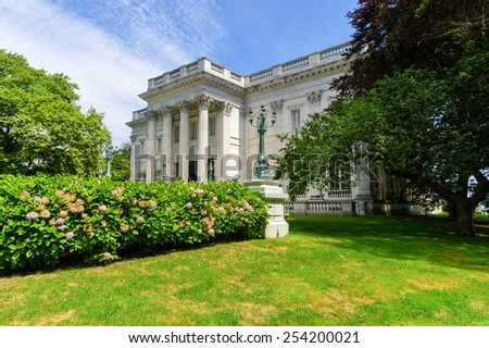 NEWPORT, RHODE ISLAND - AUGUST 4, 2013: The Marble House in Newport, Rhode Island. It is a Gilded Age mansion and its temple-front portico is like that of the White House.