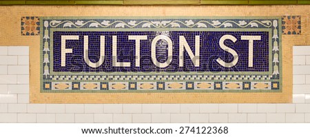 New York, NY - Apri 17, 2015: Fulton Street Subway station mosaic tile in lower Manhattan.