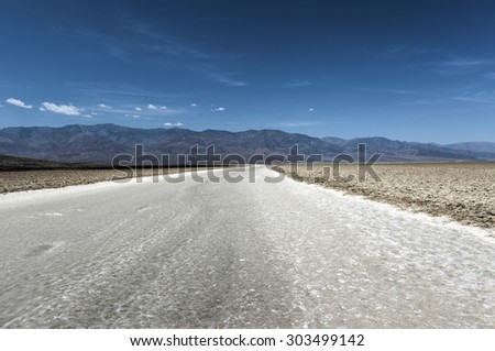 Badwater Point, Death Valley, USA. Salt road in the middle of the desert. One of the hottest places on the planet.