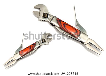 Couple of stainless steel multifunctional pocket multi tool isolated on white background