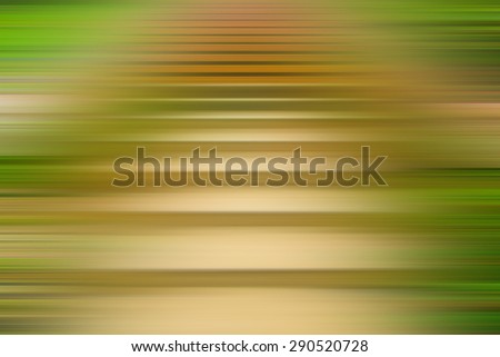 Abstract pattern of vibrant greens and browns stepping into a forest