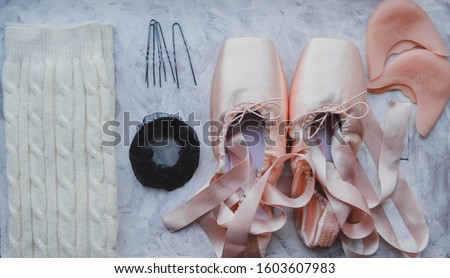 Ballerina things. Pointe shoes, knitted gaiters, hairpins, hair net, ballet silicone pad Сток-фото © 