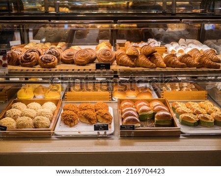 Similar – Image, Stock Photo Various sweet bakery products in basket