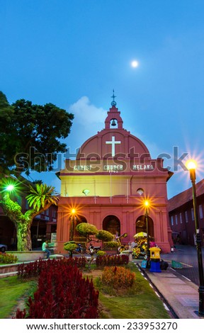 Malacca,Malaysia - October 26, 2012:Evening view of the Christ Church Malacca and Dutch Square,people can seen around the Dutch Square.
