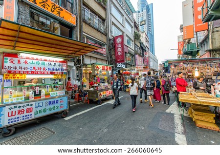 Keelung,Taiwan - March 18,2015 : Keelung Miaokou night market famous throughout Taiwan for its large selection of food.People can seen walking and exploring around it.