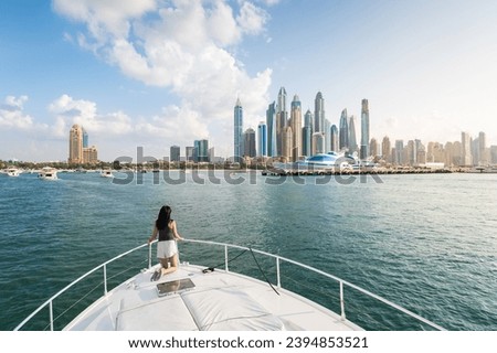 Similar – Image, Stock Photo Stylish tranquil woman against blue sky