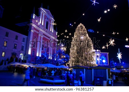 LJUBLJANA, SLOVENIA -JANUARY 1, 2012: Preseren square in festive lightning for Christmas and New Year\'s eve celebration with entertainment program. Ljubljana, Slovenia, on January 1, 2012.