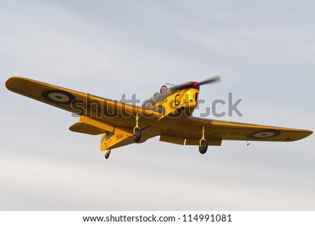 BEDFORDSHIRE, UK - OCTOBER 7: Miles M.14A Hawk Trainer in flight at the Autumn Air Show on October 7, 2012 at Shuttleworth, Old Warden Park, Bedfordshire, UK